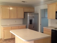 Kitchen with refrigerator